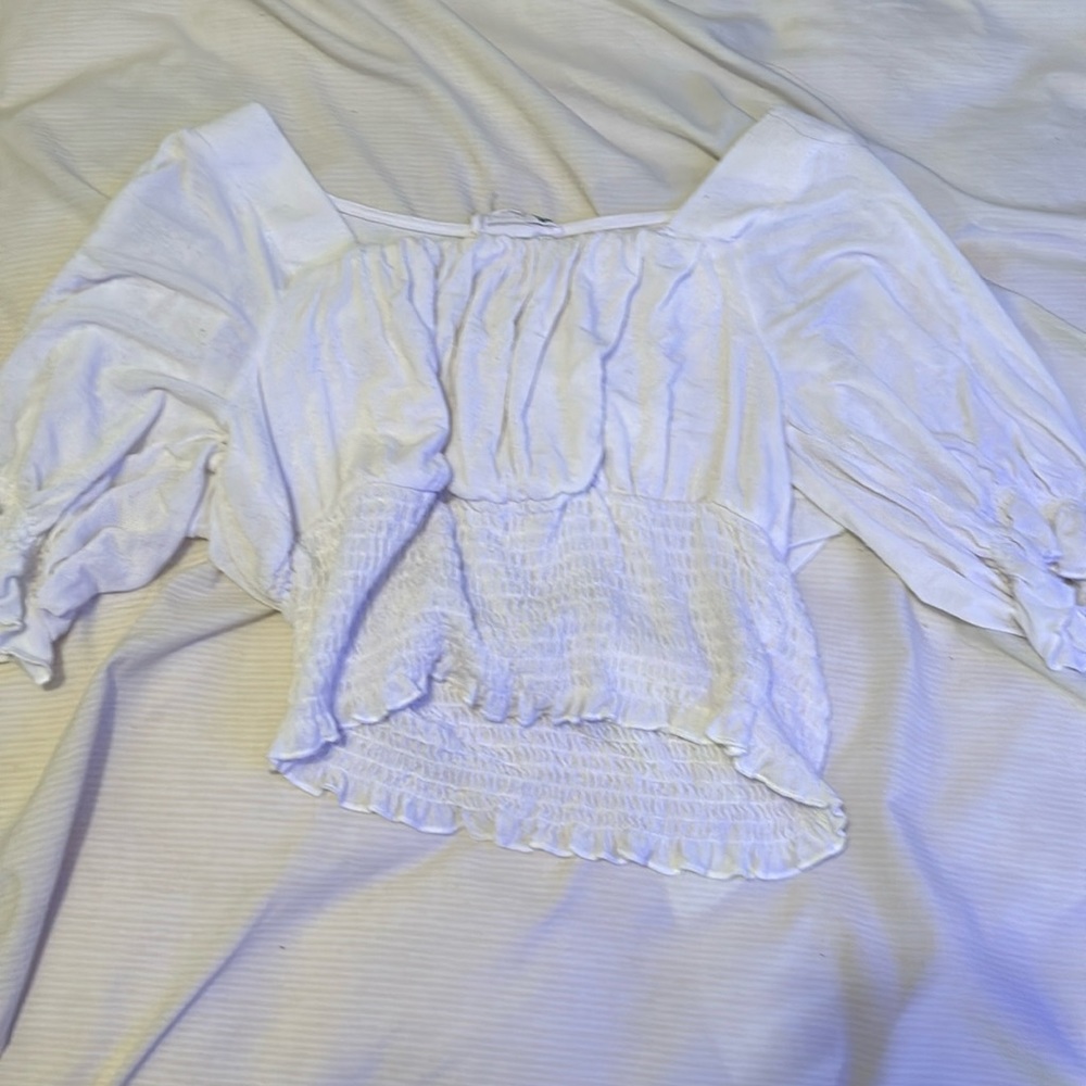 white crop top with puffy sleeves